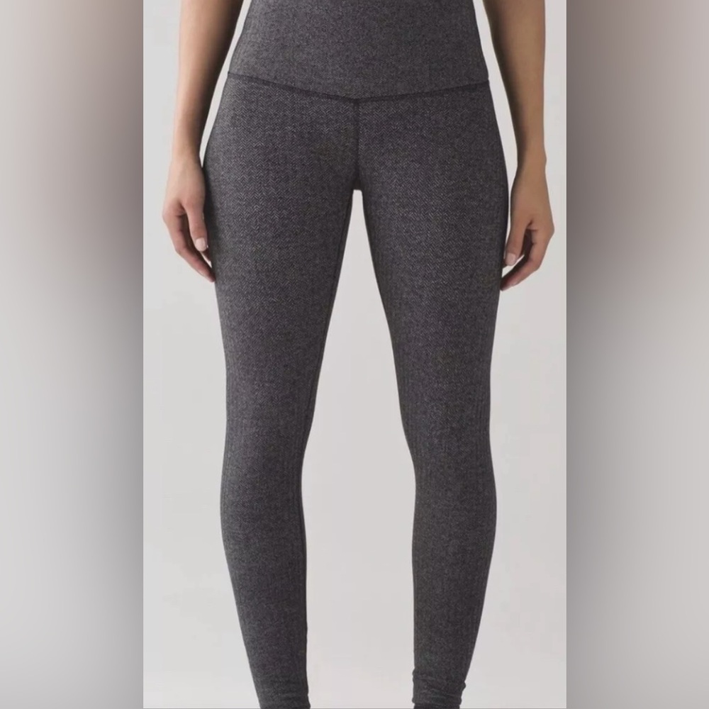 Lulu lemon heather grey high rise leggings.